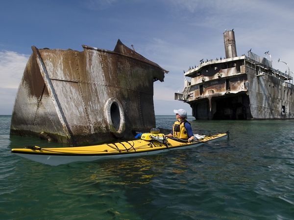 Canoeing near abandoned ships around the world