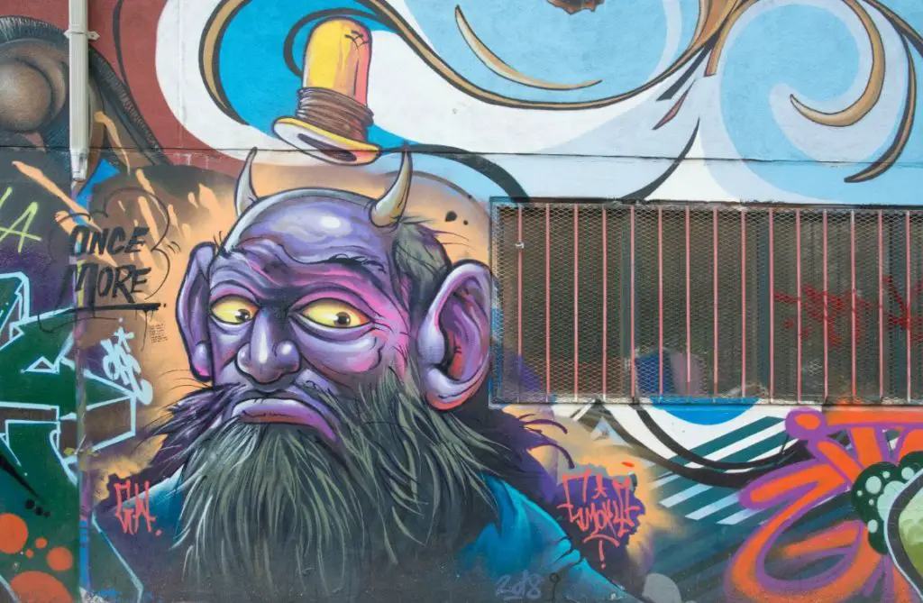 grafitti alleyway purple guy