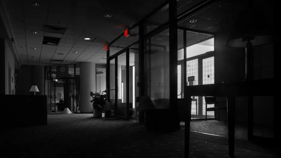 abandoned hotel lobby black and white